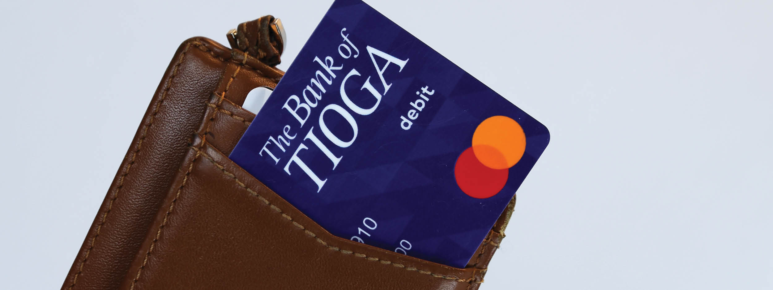 The Bank of Tioga debit card in wallet